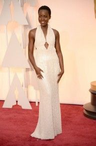 Lupita Nyong'o looked amazing in her all-white custom Calvin Klein Collection pearl gown which reportedly used 6,000 pearls!