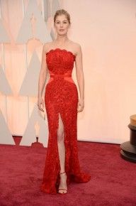 Rosamund Pike's perfect red dress highlighted her hourglass silhouette.